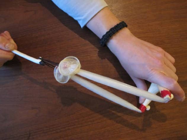 Condom-Sling-Shot-In-Use